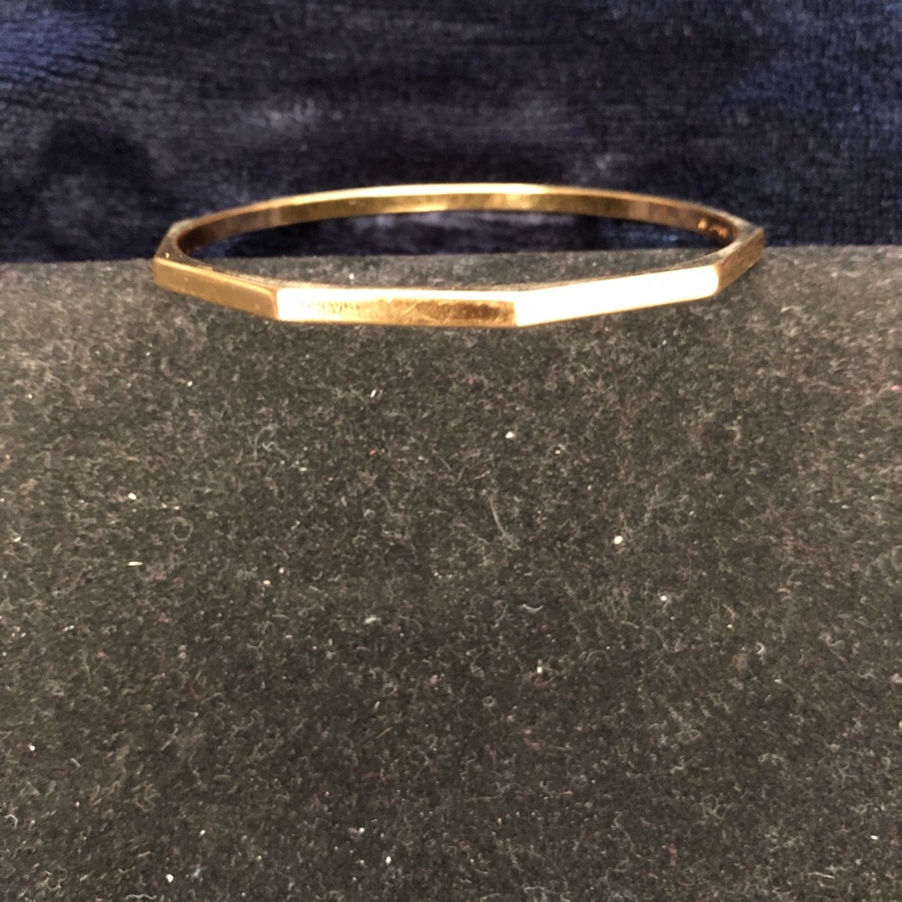 Gold tone bangle